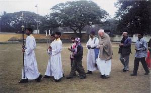 Procession to pray beside Father Mathieson's grave